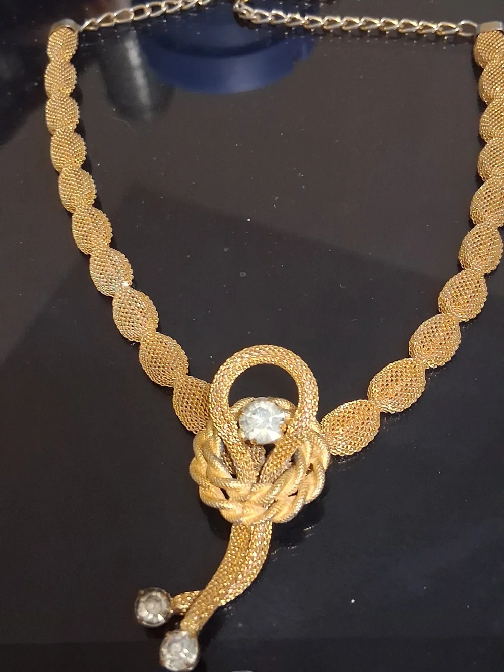 Gold-Tone Knot Necklace with Crystal Accents